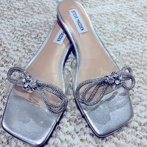 Steve Madden clear slip on shoes with crystal bow detail